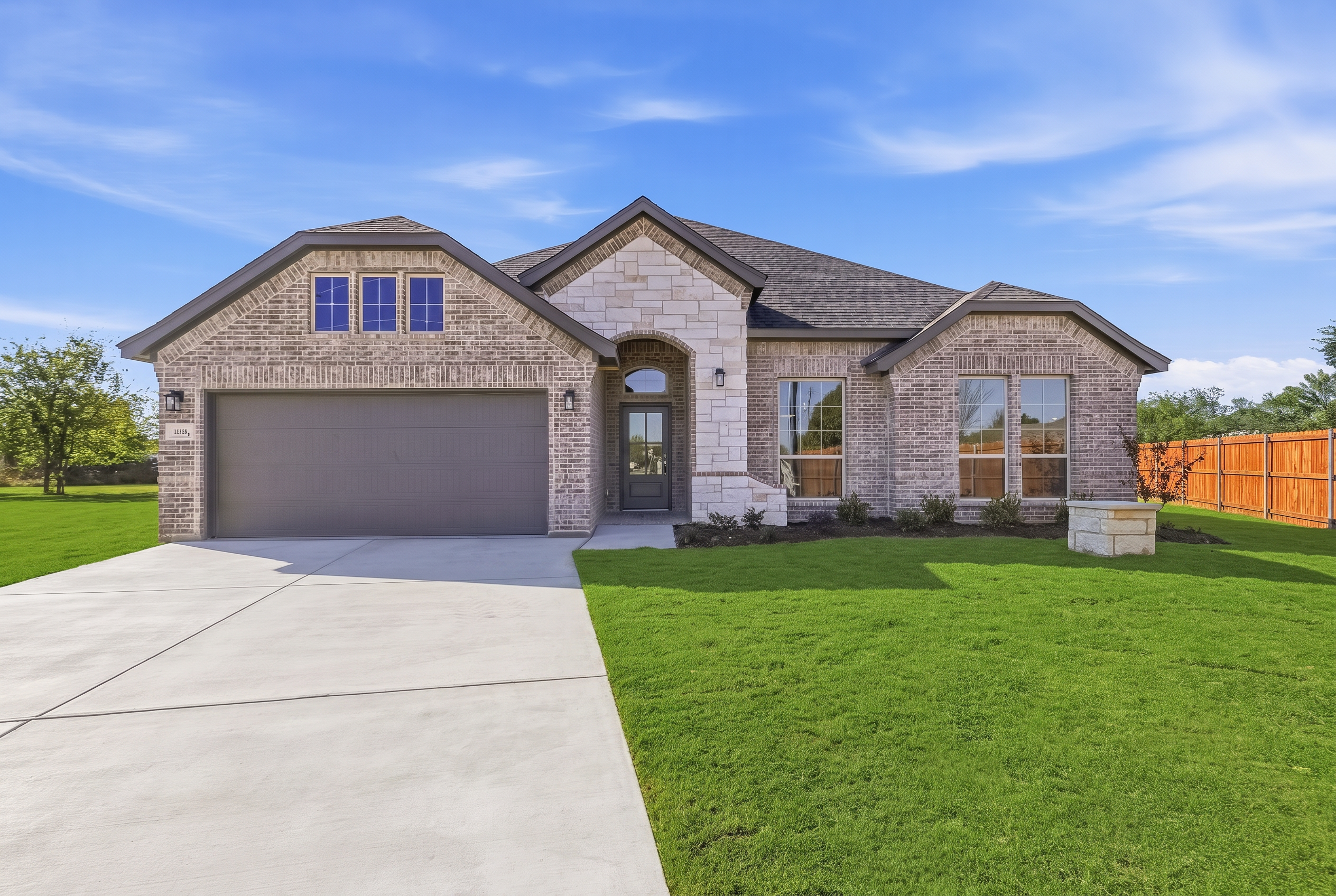 Cheldan Homes — Move-in ready Cheldan home with manicured lawn